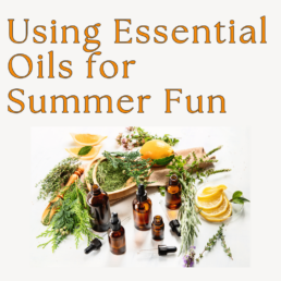 essential oils bottles and assorted natural objects, oranges and pine